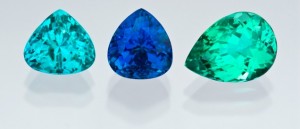 Photographed from the GIA Collection for the CIBJO project from the Dr. Eduard J. Gubelin Collection. Collection# 33379, 2.59 ct turquoise blue triangle cut Paraíba tourmaline; Collection# 33382, 3.28 ct electric blue drop cut Paraíba tourmaline; and Collection# 33378, 3.68 ct green pear cut Paraíba tourmaline.